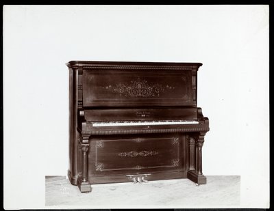 A piano by Newby and Evans Piano Co., 1907 by Byron Company